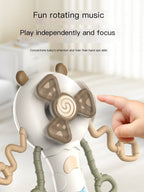 Spinning donut head on Busy Shake the Stick sensory toy